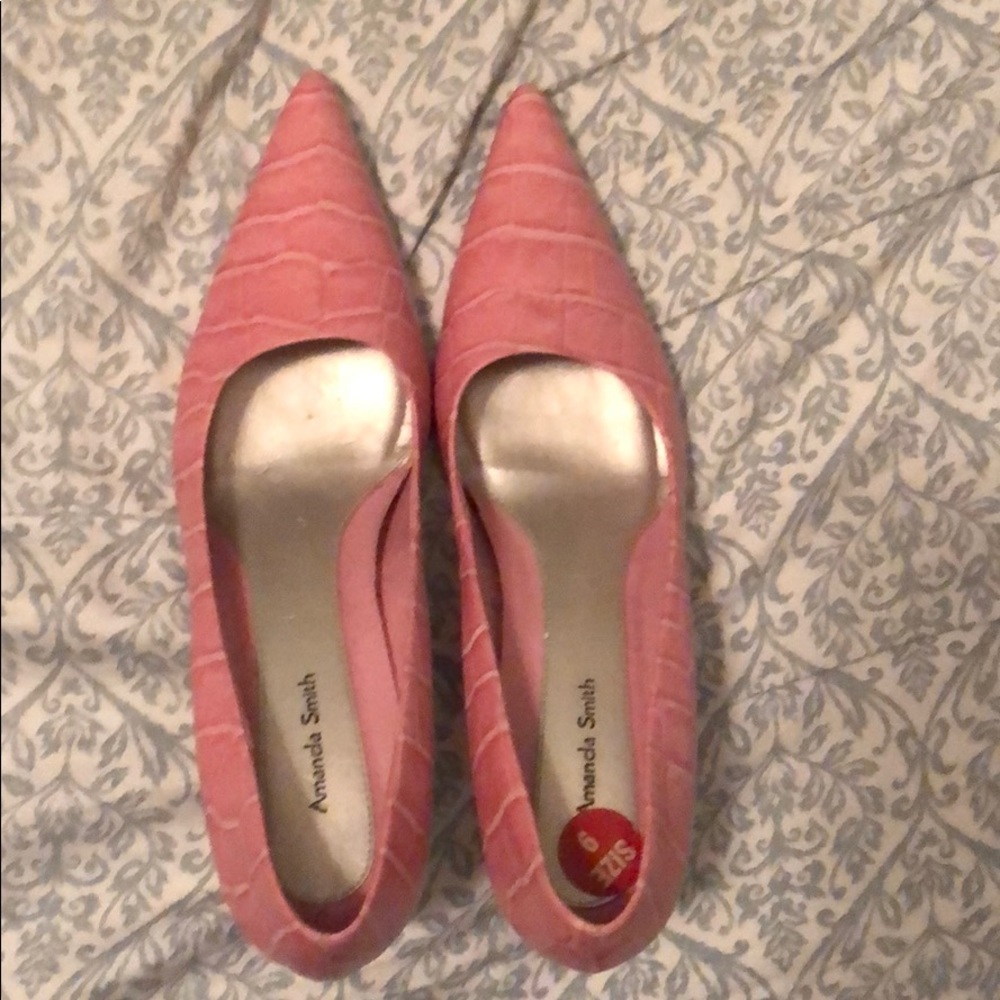 Pink low heels with pointy toe